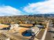 Community view showcasing a home with ample yard space and mountain views at 909 E Desert Ln, Phoenix, AZ 85042