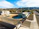 Desert home with a spacious yard, mountain views, and proximity to neighborhood amenities at 909 E Desert Ln, Phoenix, AZ 85042
