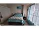 Cozy bedroom featuring a comfortable queen-sized bed and closet at 921 W University Dr # 1101, Mesa, AZ 85201