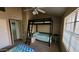 Bedroom with a bunkbed and large window with natural light at 921 W University Dr # 1101, Mesa, AZ 85201