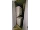 Compact laundry area featuring a stacked washer and dryer, perfect for saving space at 921 W University Dr # 1101, Mesa, AZ 85201