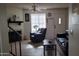 Living room featuring tile floors, fireplace, ceiling fan, and comfortable seating arrangement at 921 W University Dr # 1101, Mesa, AZ 85201