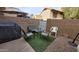 Private patio features outdoor seating with synthetic grass and privacy walls at 921 W University Dr # 1101, Mesa, AZ 85201