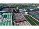 Aerial view showcases community sports courts; tennis, shuffleboard and basketball at 11408 E Natal Ave, Mesa, AZ 85209