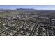 Aerial view of neighborhood with mountain views provides a sense of community and natural beauty at 11408 E Natal Ave, Mesa, AZ 85209