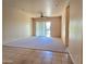 Bright, spacious living room with sliding door and neutral carpet at 13139 N Northstar Dr, Fountain Hills, AZ 85268