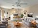 Inviting living room showcasing comfortable seating, stylish decor, and a ceiling fan for added comfort at 15650 N 19Th Ave # 1189, Phoenix, AZ 85023