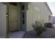 Inviting front entrance with a security screen door and desert landscaping at 1587 E Brenda Dr, Casa Grande, AZ 85122