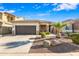 Beautiful single story home with low maintenance landscaping, and inviting color palette at 17193 N Rosemont St, Maricopa, AZ 85138