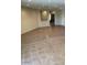 Spacious living room with wood flooring, recessed lighting, and a view of the entrance hall at 18298 N Kari Ln, Maricopa, AZ 85139