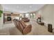 Spacious living area showcasing carpeting, plenty of recessed lights, and an open design at 18298 N Kari Ln, Maricopa, AZ 85139