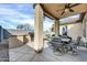 Covered patio featuring a ceiling fan, and a built-in grill at 18298 N Kari Ln, Maricopa, AZ 85139