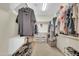 Organized walk-in closet with ample storage space and custom shelving at 18298 N Kari Ln, Maricopa, AZ 85139