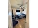 Cozy bedroom with a ceiling fan, window and hardwood floors at 20407 W Calle Encorvada --, Buckeye, AZ 85396