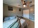 Bedroom featuring neutral colors, wood-look flooring, and a ceiling fan at 20407 W Calle Encorvada --, Buckeye, AZ 85396