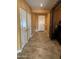 Bright and inviting entryway featuring tiled floors, white doors, and neutral colored walls at 20407 W Calle Encorvada --, Buckeye, AZ 85396