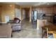 Open-concept living area connecting the kitchen and living room with a relaxed atmosphere at 20407 W Calle Encorvada --, Buckeye, AZ 85396