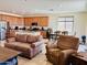 Open-concept living room showcasing the kitchen and dining area, perfect for modern living at 20407 W Calle Encorvada --, Buckeye, AZ 85396