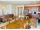 An open-concept living and kitchen area with wood flooring at 20407 W Calle Encorvada --, Buckeye, AZ 85396