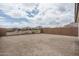 Large backyard with block fence, ready for landscaping and outdoor living enhancements at 21291 W Edgemont Ave, Buckeye, AZ 85396