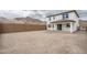 Expansive backyard with view of surrounding mountains ready for personalization and landscaping at 21291 W Edgemont Ave, Buckeye, AZ 85396
