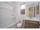 Bathroom featuring a shower and tub combination and a single sink vanity at 21291 W Edgemont Ave, Buckeye, AZ 85396