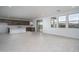 Open-concept living area combining kitchen, dining, and living spaces for seamless entertaining at 21291 W Edgemont Ave, Buckeye, AZ 85396