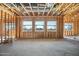 Unfinished room showcasing a bank of windows in new home construction at 29022 N 166Th Ave, Surprise, AZ 85387