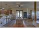 Bright dining area with a view into the kitchen and a dining table situated on an area rug at 31107 N 164Th St, Scottsdale, AZ 85262