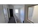 Second floor hallway featuring carpeted floors at 3113 E Danbury Rd # 5, Phoenix, AZ 85032