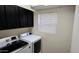 Laundry room with a window and new appliances at 3113 E Danbury Rd # 5, Phoenix, AZ 85032