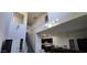 This living room features a staircase and high ceilings at 3113 E Danbury Rd # 5, Phoenix, AZ 85032
