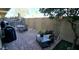 Private patio with an outdoor seating area, a grill, and desert landscaping at 3113 E Danbury Rd # 5, Phoenix, AZ 85032