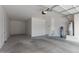 Spacious garage with modern door and plenty of room for storage and parking at 41262 W Almira Dr, Maricopa, AZ 85138