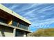 Striking exterior architecture with large windows offering panoramic views of the Arizona landscape at 4232 E Upper Ridge Way, Paradise Valley, AZ 85253
