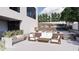 A cozy outdoor patio with modern seating, perfect for relaxing and entertaining guests at 4232 E Upper Ridge Way, Paradise Valley, AZ 85253