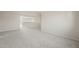 Spacious bonus room showcases neutral walls and flooring, providing a blank canvas for your personal touch at 42860 W Palo Abeto Dr, Maricopa, AZ 85138