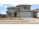 Beautiful two story home featuring a two car garage and low maintenance desert landscaping at 42860 W Palo Abeto Dr, Maricopa, AZ 85138