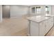 Open-concept living space with tile floors, recessed lighting, and a bright atmosphere at 42965 W Palo Abeto Dr, Maricopa, AZ 85138