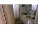 Bathroom features a walk-in shower, vanity with a sink, and a mirror at 44 S Hawes Rd # C13, Mesa, AZ 85208