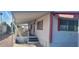 Exterior view of manufactured home featuring covered porch with room for seating at 44 S Hawes Rd # C13, Mesa, AZ 85208