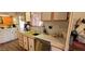 Kitchen with white cabinetry, stainless steel dishwasher, and yellow sink at 44 S Hawes Rd # C13, Mesa, AZ 85208