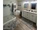 Elegant bathroom with a glass-enclosed shower, freestanding tub, dual sinks, and modern fixtures for a spa-like experience at 4435 E Badger Way, Phoenix, AZ 85044