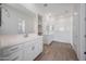 Bright primary bathroom with dual vanities and walk-in shower at 44729 N 44Th Dr, Phoenix, AZ 85087