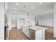 Modern kitchen with white cabinetry, stainless steel appliances, and a center island at 44729 N 44Th Dr, Phoenix, AZ 85087
