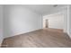 Bright living room featuring tile flooring with a doorway into the hallway at 44729 N 44Th Dr, Phoenix, AZ 85087