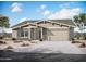 Charming single-story home featuring desert landscaping and a two-car garage at 44815 N 44Th Dr, Phoenix, AZ 85087