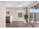 Open concept dining area features ample natural light and sliding door access to the patio at 4722 W Escuda Dr, Glendale, AZ 85308