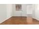 Cozy bedroom features wood floors, natural light from the window, and white walls at 501 W Hononegh Dr # 2, Phoenix, AZ 85027