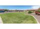 Exterior view of the community with well-maintained landscaping and manicured lawns at 501 W Hononegh Dr # 2, Phoenix, AZ 85027